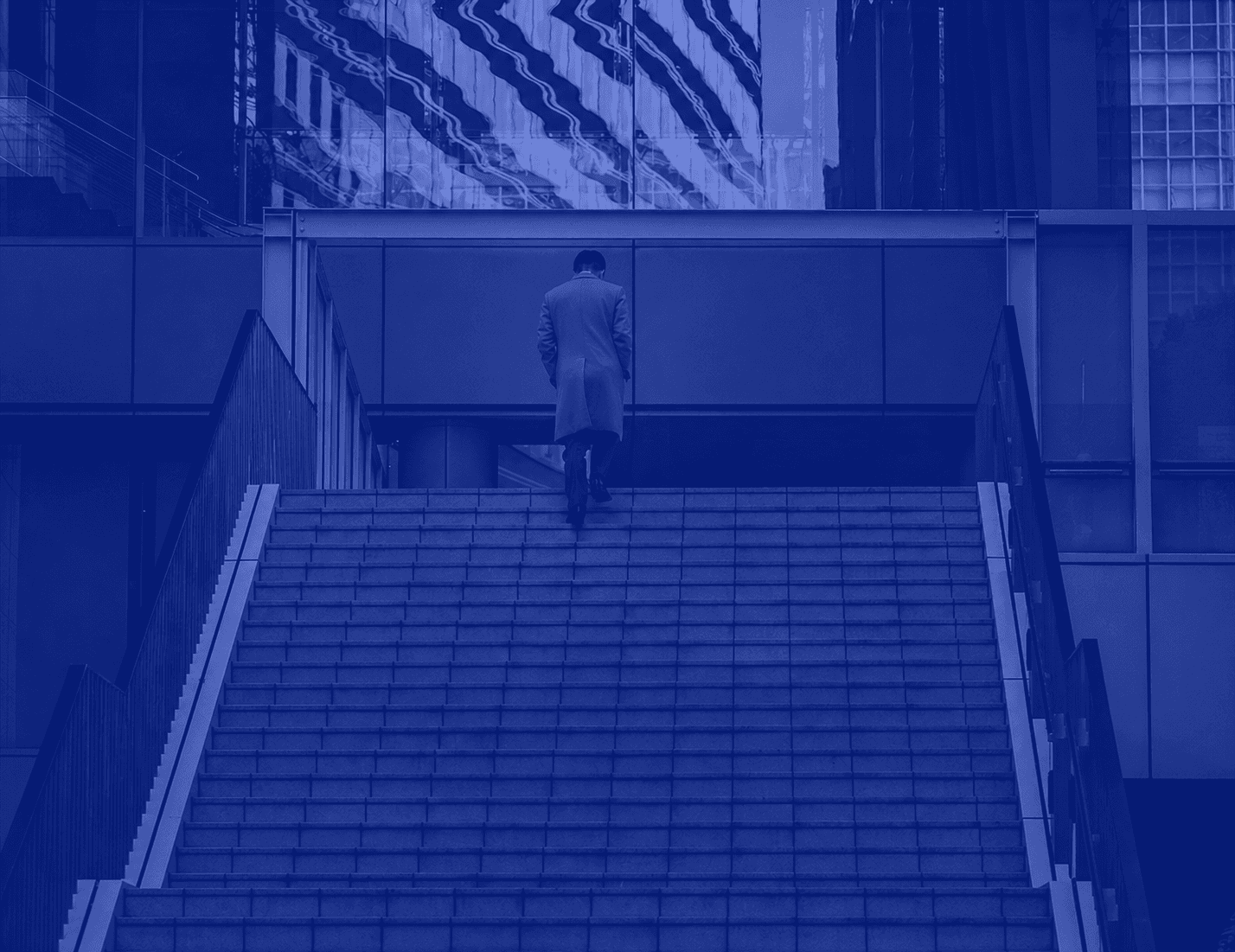 Person walking through a city stairway